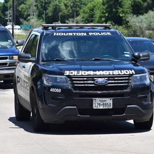 police vehicle on the road, representing DWI Traffic Stops In Texas - Law Office of Ira Z. Miller